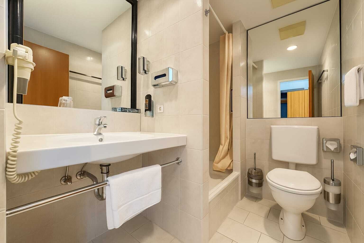Hair dryer, towels, soap, shampoo