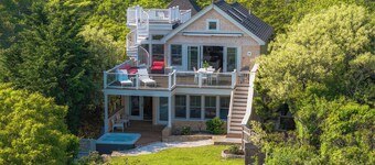 Large beachfront home with panoramic views and A.C. and hot tub.