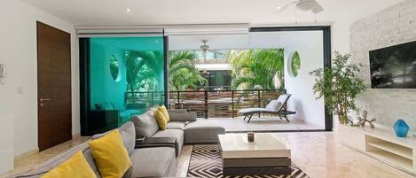 Apartment, Mehrere Betten, Poolzugang, Gartenblick (Encanto E212) | Wohnbereich