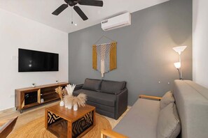 Condo, Multiple Beds, Pool Access, Pool View (ZTP05(Propietarios)) | Living area | Fireplace - Best Private Pool/1 Full BR/ 2sofabeds/amenities (Tulum)