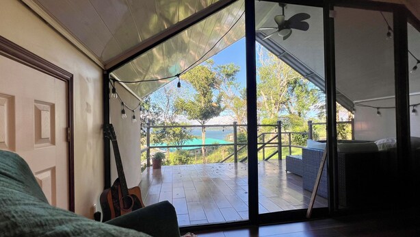 Terrace/patio - Charming 2-bedroom Lake View House in Puerto San Luis with WiFi (puerto san luis)