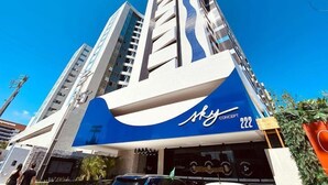 A modern hotel with a prominent blue and white facade, featuring the name 'Sky Concept' and the number '222'. - Sky Concept 816 (Maceió)