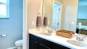 Hair dryer, towels, soap, shampoo