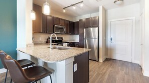 Fridge, microwave, oven, stovetop - Landing | Stylish 1BD, Pool, Game Room (New Braunfels)