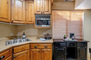 Fridge, microwave, coffee/tea maker, toaster