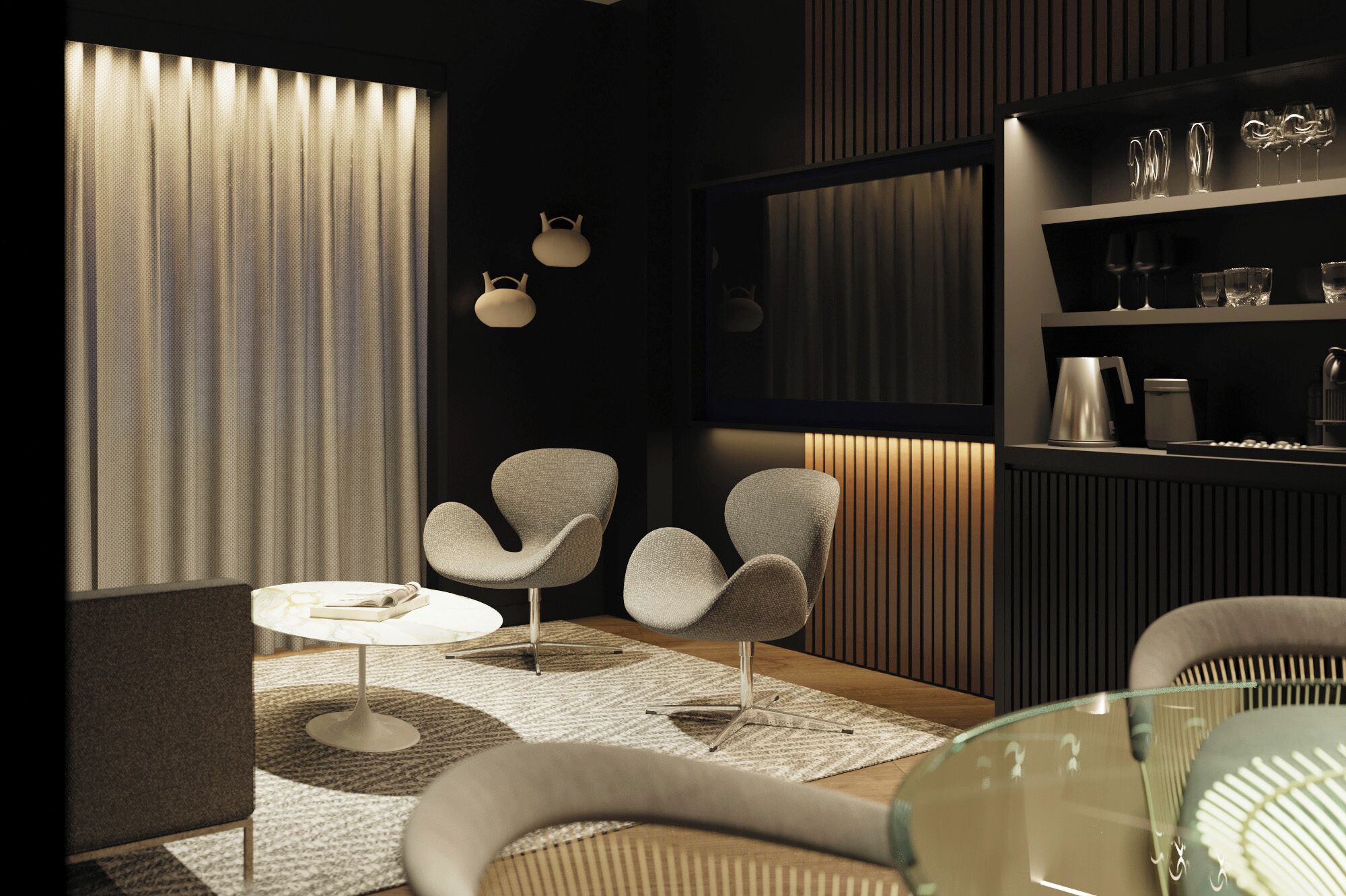 A modern living room with a sofa, two armchairs, a coffee table, and a glass table. There is a bookshelf with decorative items and a coffee machine.
