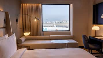 Premium Suite, 1 King Bed, Non Smoking | Premium bedding, down duvets, memory-foam beds, minibar