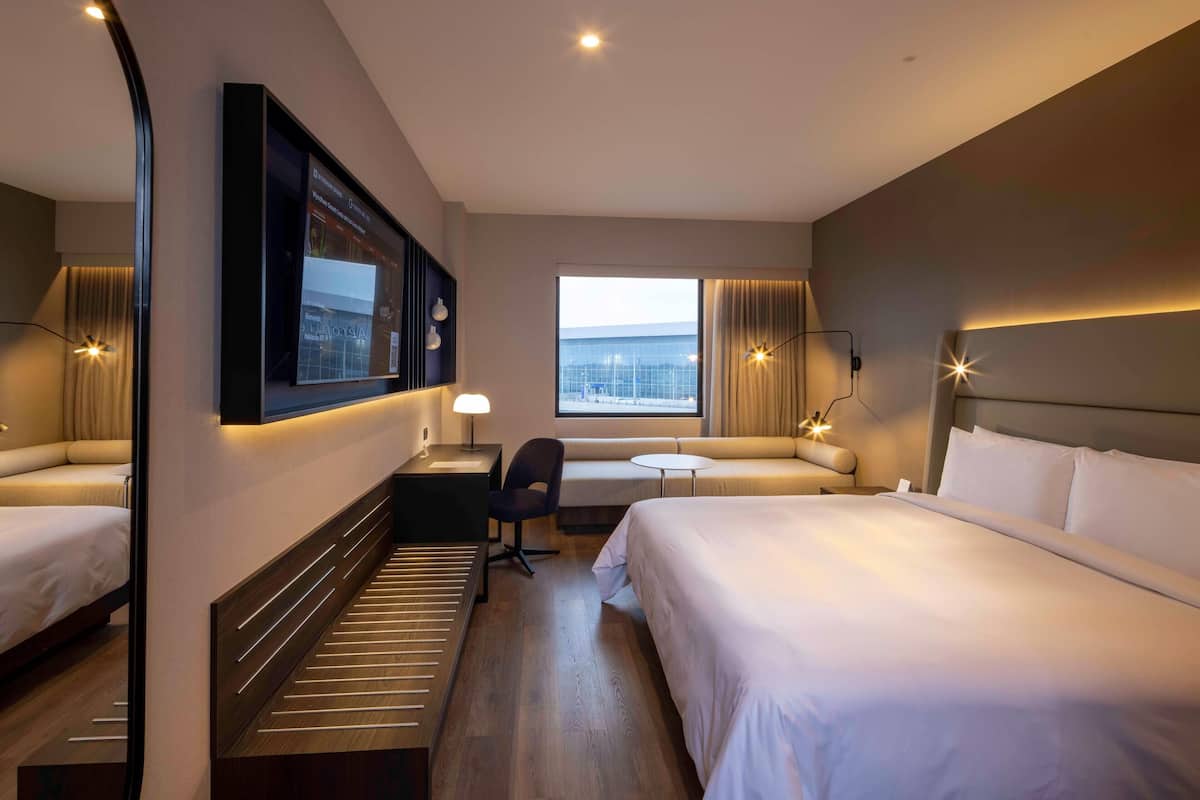 Premium bedding, down comforters, memory foam beds, minibar