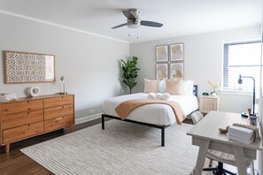 1 bedroom, desk, iron/ironing board, travel crib