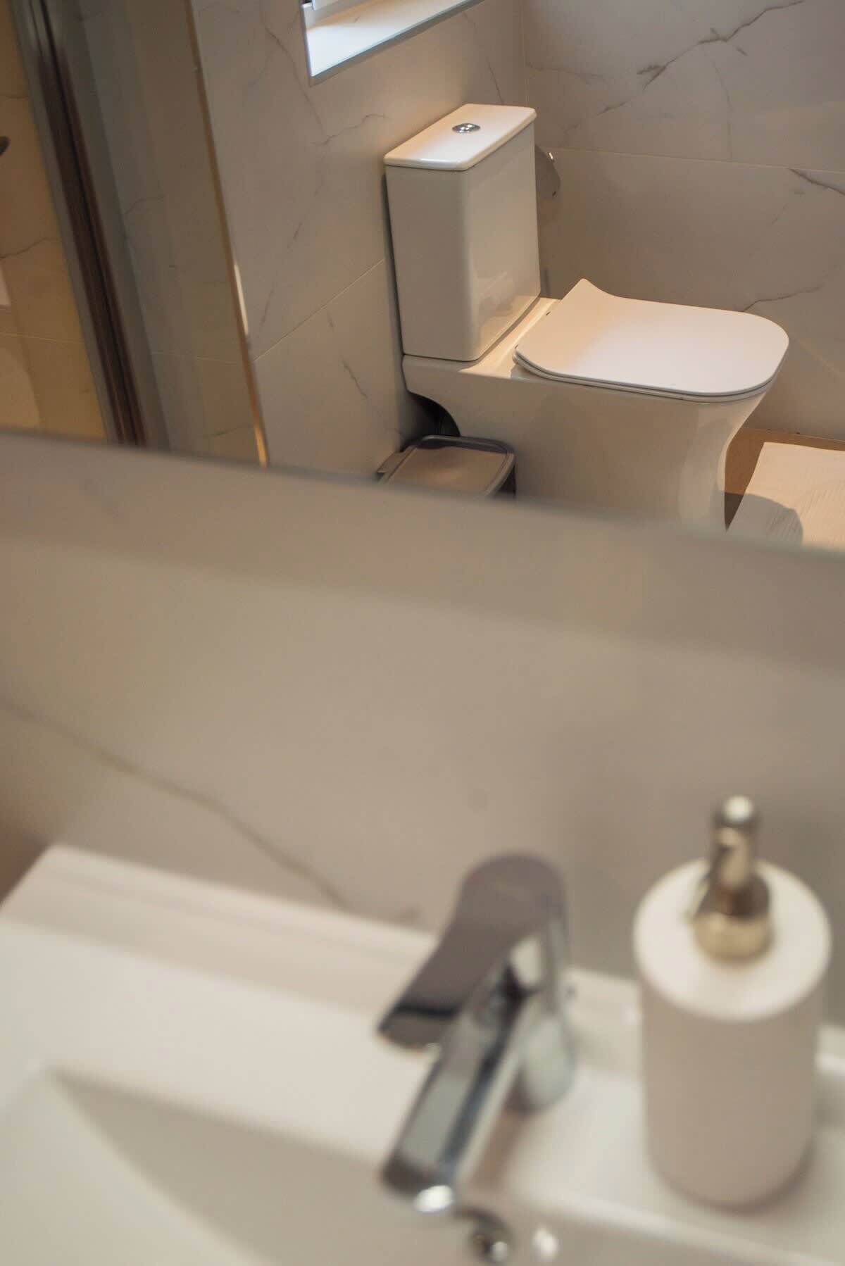 Shower, hair dryer, shampoo