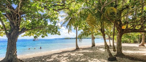 On the beach, white sand