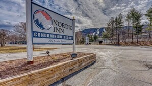 A sign for Nordic Inn Condominium Resort at 227 Main Street.