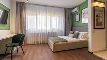 Cortinas blackout, tabla de planchar con plancha y wifi gratis