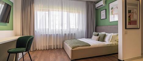 Cortinas blackout, tabla de planchar con plancha y wifi gratis