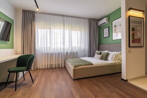 Rideaux occultants, fer et planche à repasser, Wi-Fi gratuit