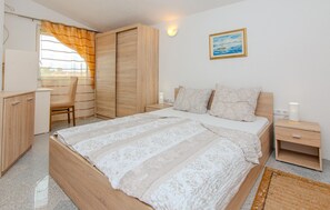 2 quartos, berço de viagem, Wi-Fi de cortesia, roupa de cama