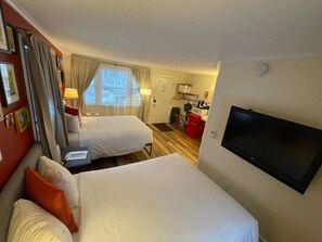 Iron/ironing board, travel crib, WiFi, bed sheets