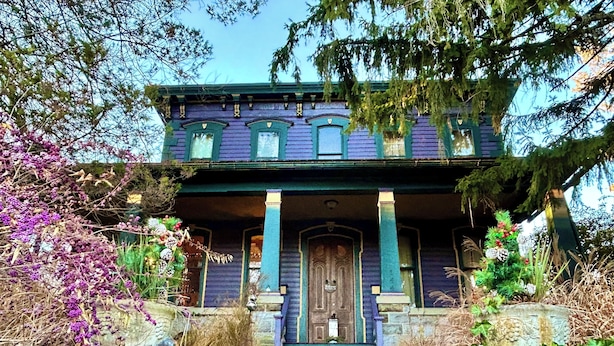 A two-story house with a porch, stone steps, and a wooden door. - Cobalt Suite at The Amethyst Inn B&B, jacuzzi, fireplace, gourmet breakfast (Adamstown)