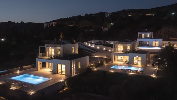 A modern villa with multiple bedrooms, a swimming pool, and a landscaped garden. - 200m to the beach | brand new 2024 | Villa Erato - Elysian Villas (Kefalonia)