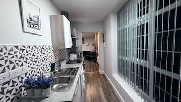 Apartment | Private kitchen | Fridge, microwave, oven, stovetop