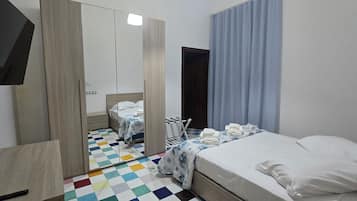 Familienapartment | 1 Schlafzimmer, Daunenbettdecken, Betten mit Memory-Foam-Matratzen