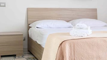 Familienapartment, Mehrere Betten, Nichtraucher, eigenes Bad | 1 Schlafzimmer, Daunenbettdecken, Betten mit Memory-Foam-Matratzen