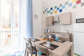 Family Apartment | Private kitchen | Full-size fridge, microwave, oven, stovetop