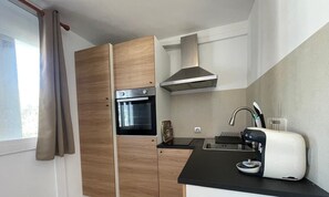 Fridge, microwave, coffee/tea maker, electric kettle