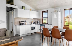 Fridge, stovetop, dishwasher, coffee/tea maker