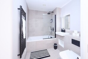 Hair dryer, towels, soap, toilet paper