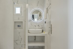 Dutxa, assecador de cabells i tovalloles 