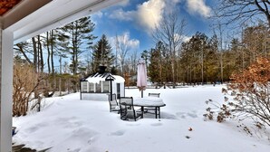 A snow-covered patio with a small gazebo, a table, and chairs. - Chittenden Farmhouse: Historic 4BR/2BA, 20 Min to Killington, 7 Min to Mountaintop Resort (Chittenden)