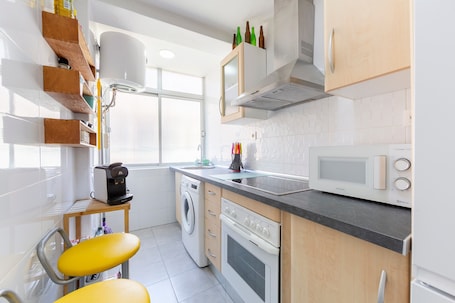 Fridge, microwave, oven, stovetop. Zapillo Apartment with Wi-Fi and Air Conditioning