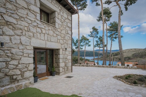 Villa 'El Nogal de Marieta' with Lake Views, Wi-Fi, and Air Conditioning
