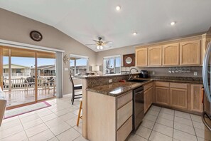Fridge, microwave, oven, stovetop - Coastal Canal Cottage - Waterfront, Dock, Pools (Port Isabel)