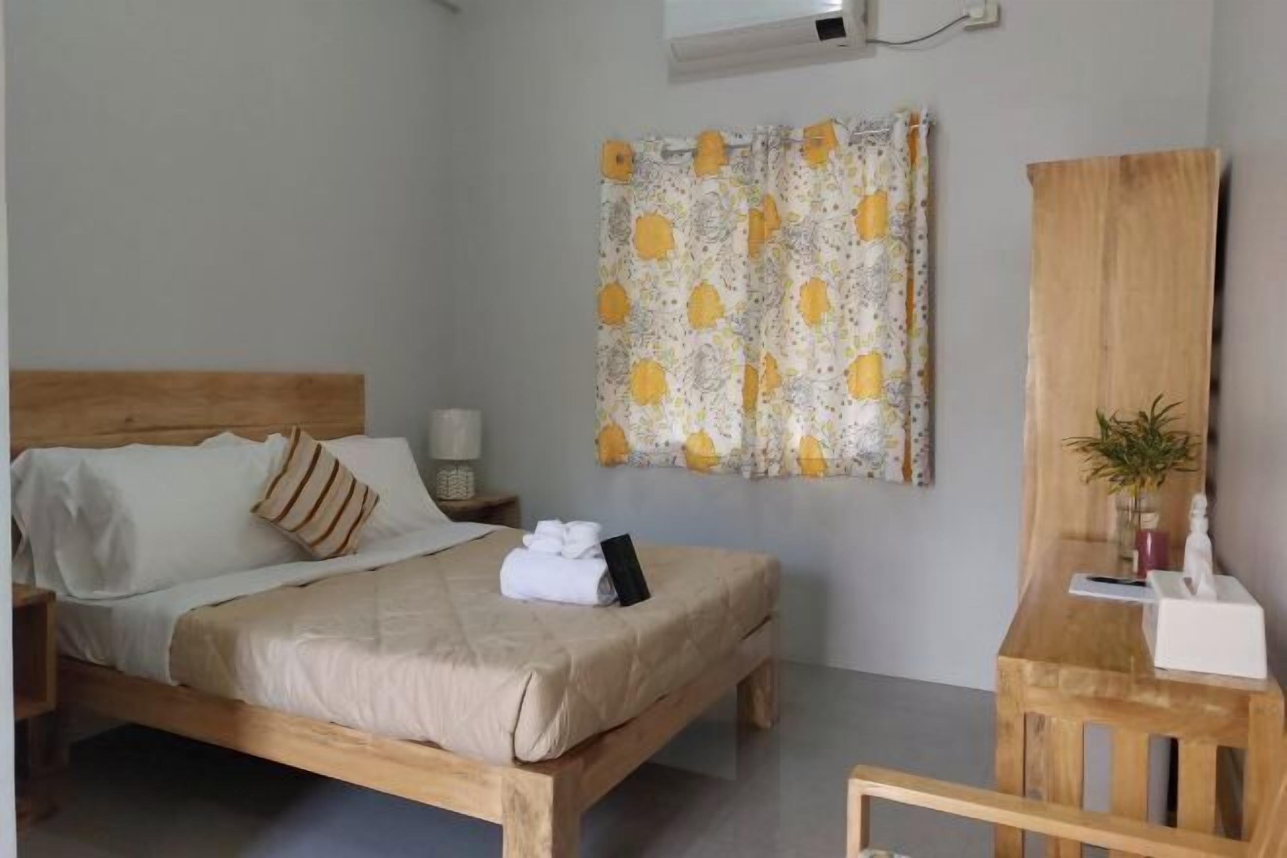 Desk, laptop workspace, blackout curtains, free WiFi