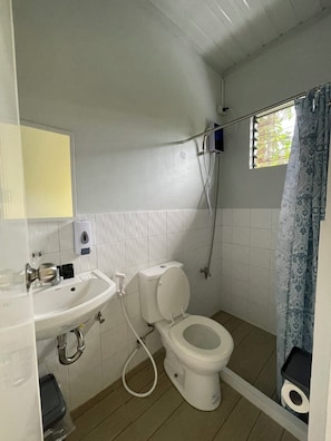 Shower, slippers, towels, soap