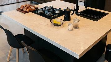 Deluxe Loft, Hill View | Private kitchen | Oven, stovetop, cookware/dishes/utensils