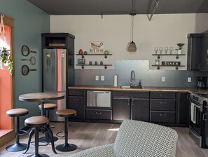 Fridge, microwave, oven, stovetop - Downtown loft w/ game theme (Rapid City)