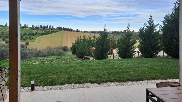 A covered patio with a view of a green field and trees. - Roseto Apartments Trilo 2 by Interhome (Roseto degli Abruzzi)