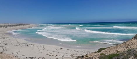 On the beach, white sand