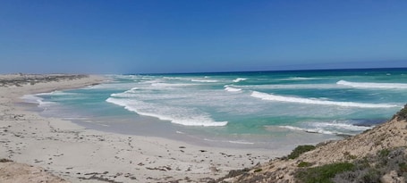 On the beach, white sand