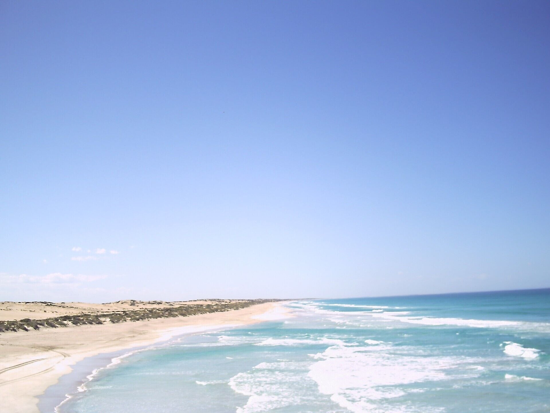 On the beach, white sand