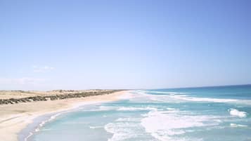 On the beach, white sand