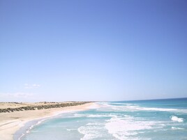 On the beach, white sand