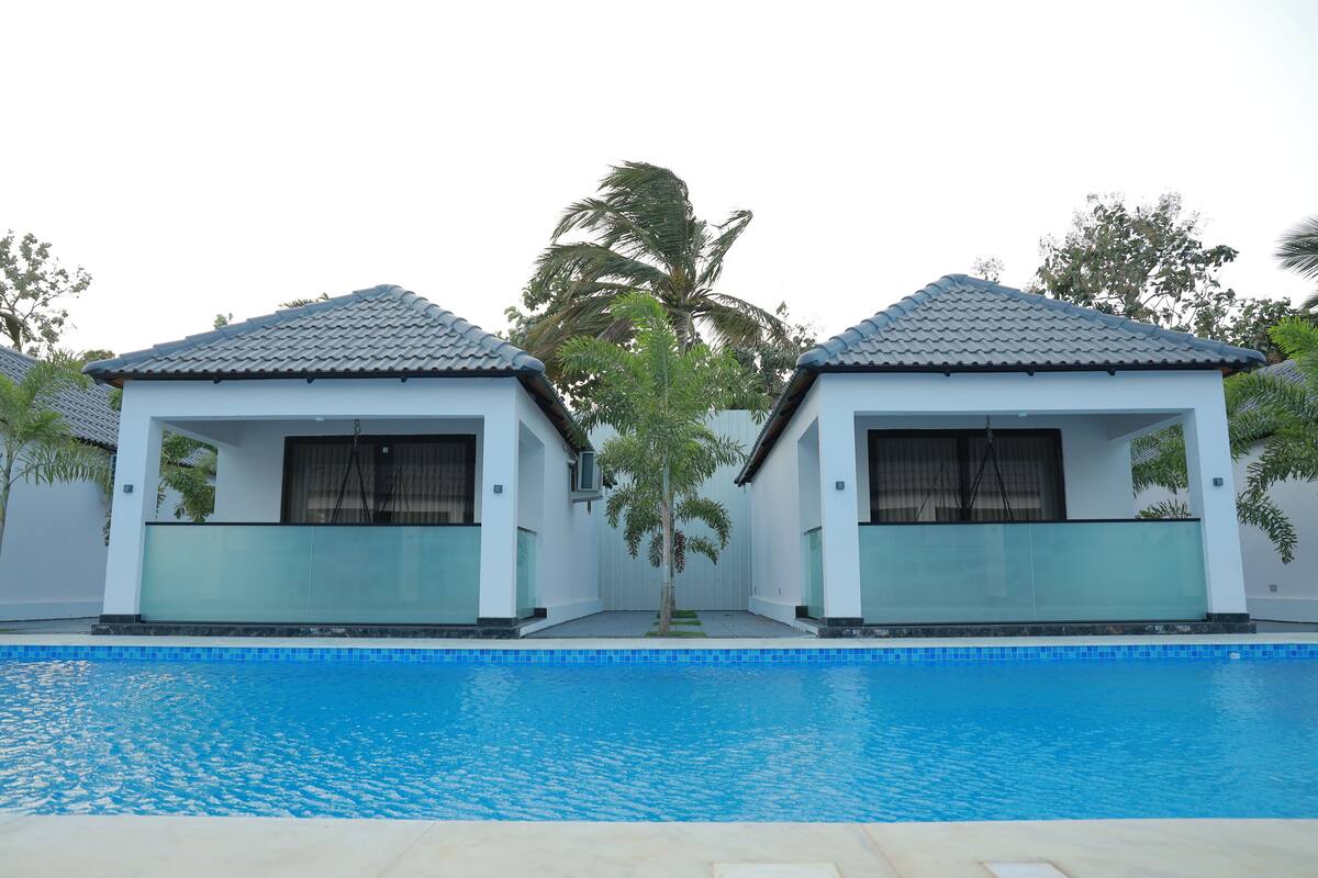Deluxe Cottage, Non Smoking, Pool View | 2 bedrooms, free WiFi