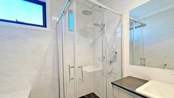 Shower, hair dryer, towels, soap