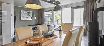 Waterfront holiday home with a large garden