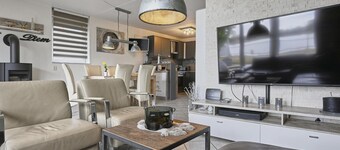 Waterfront holiday home with a large garden