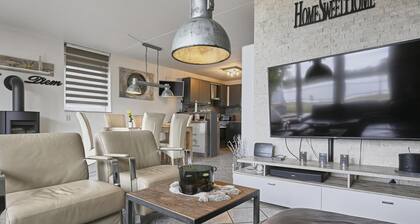 Waterfront holiday home with a large garden